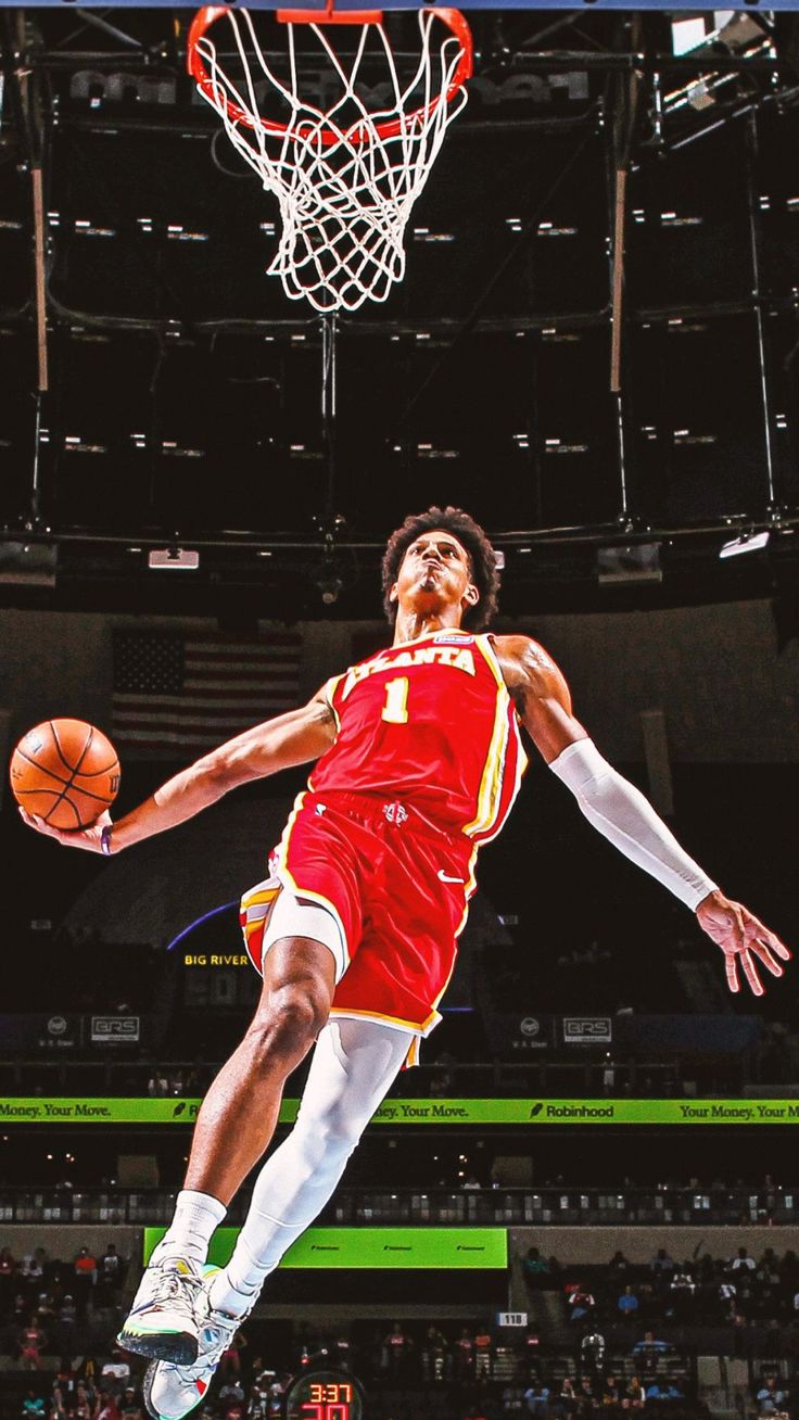 Jalen Johnson dunking in an NBA game